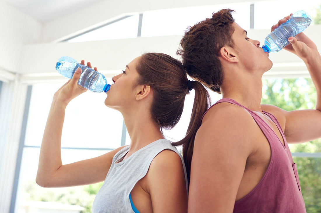 Two people rehydrating after dehydration.