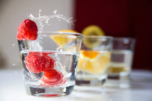 Water and Fruits in a Glass