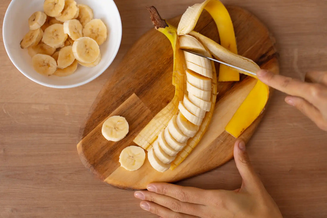 top view of cut bananas on a wooden board - potassium-rich food, emphasizing the importance of potassium for a healthy diet