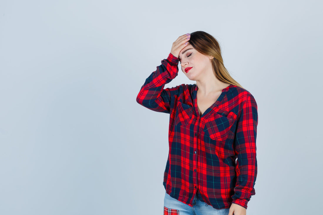 Young women suffering with migraine 